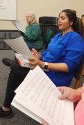 Sheri and Shama practice their tenor part